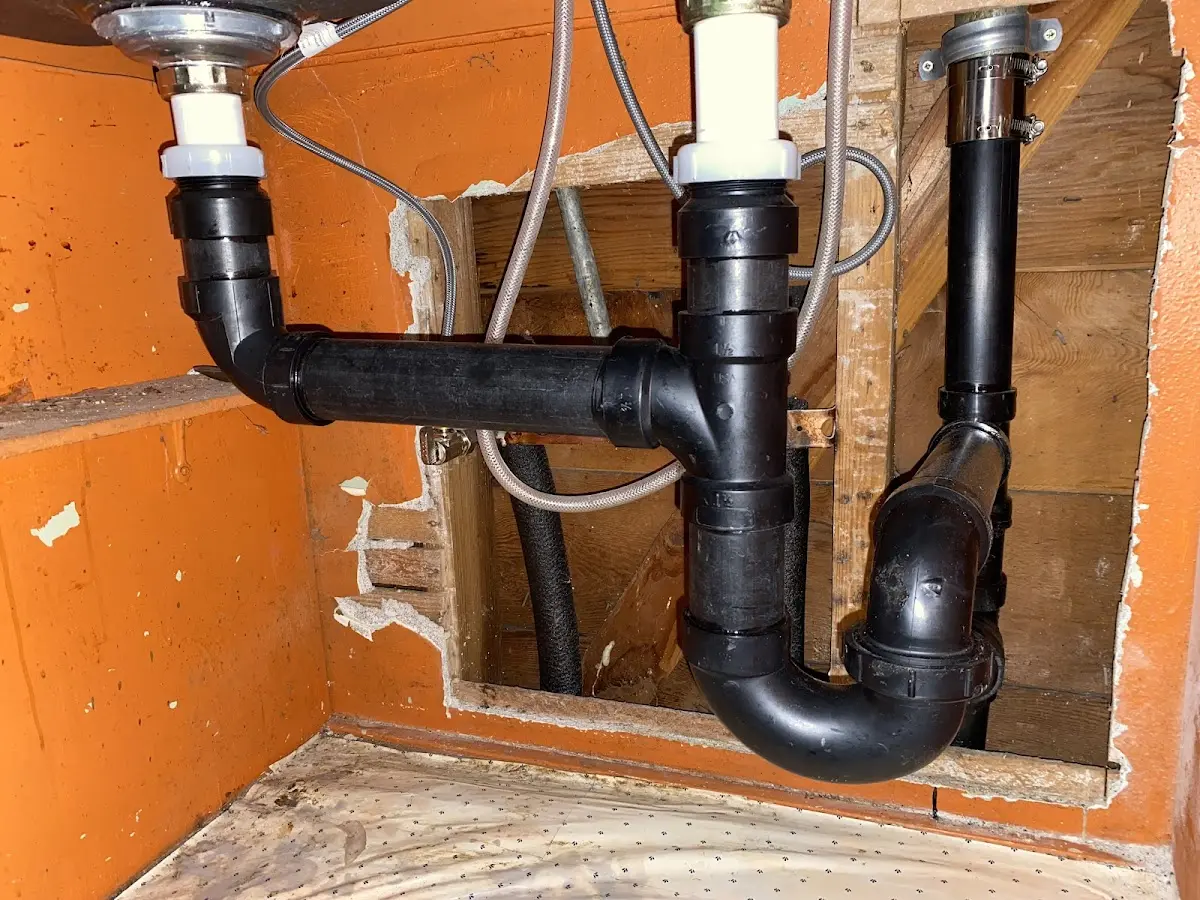 Professional Garbage Disposal Repair equipment and tools on the job in Farmington